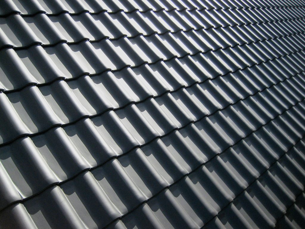 Image of painted ceramic tile house roof