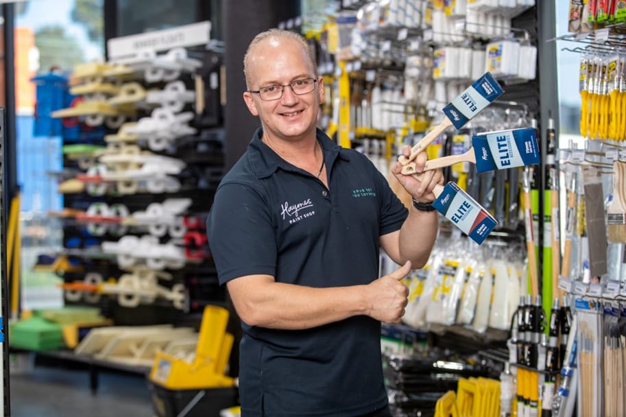 Network Render & Paint team member in store ready to assist with choosing the right paint finish